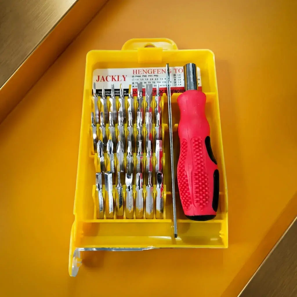 Kit de destornillador de precisión con 32 puntas intercambiables y mango magnético. Ideal para reparaciones electrónicas y bricolaje.