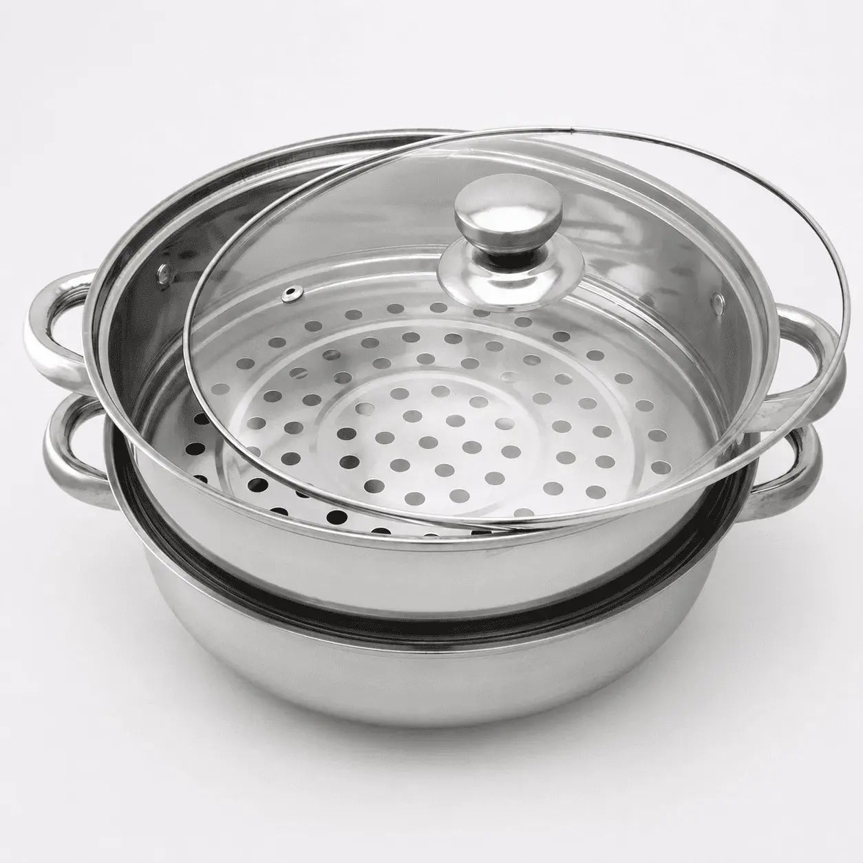 Olla vaporera de doble nivel en aluminio para cocinar sin aceite. Ideal para preparar alimentos saludables conservando sabor y nutrientes.