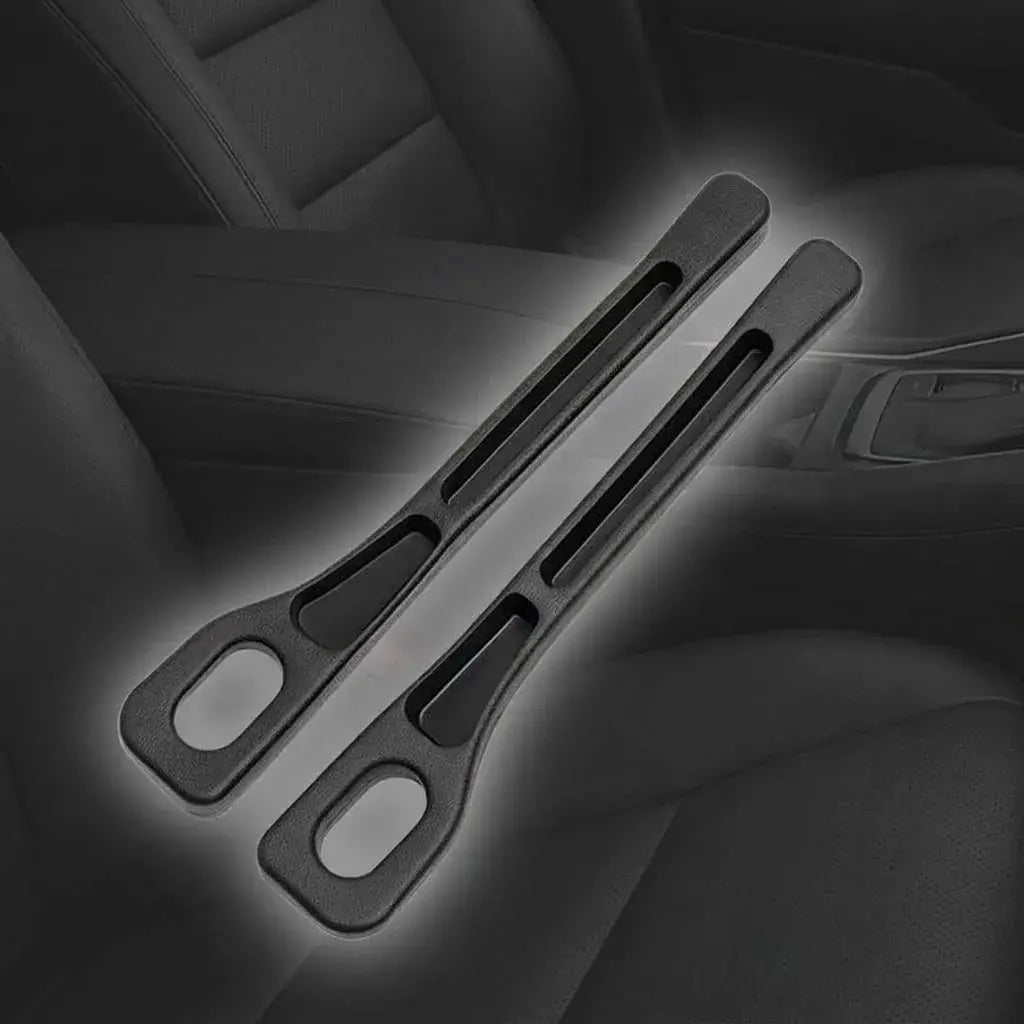Organizador anticaídas para asiento de carro en poliuretano, con espacio para celular, llaves y tarjetas. Fácil de instalar y ajustar.