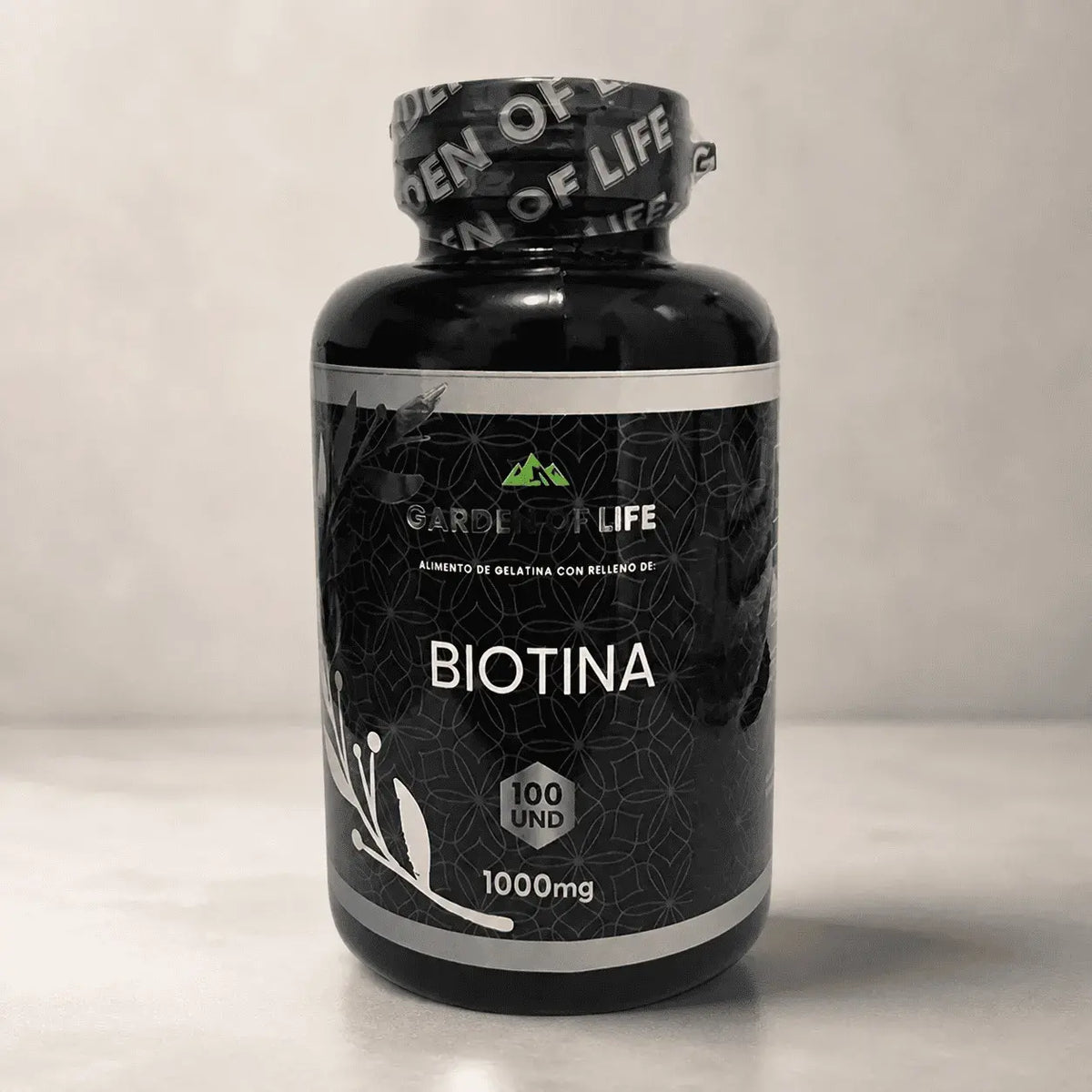 Biotina Garden of Life por 100 cápsulas blandas, suplemento con registro INVIMA para complementar la alimentación y apoyar cabello, piel y metabolismo.