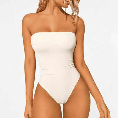 Body strapless en suplex para mujer, tela elástica y suave con ajuste cómodo al cuerpo. Disponible en negro, beige, blanco y vinotinto, tallas S a XL.