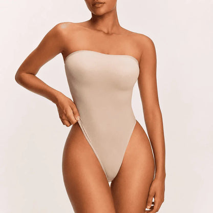 Body strapless en suplex para mujer, tela elástica y suave con ajuste cómodo al cuerpo. Disponible en negro, beige, blanco y vinotinto, tallas S a XL.