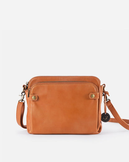 Bolso bandolera en cuero genuino compacto con múltiples compartimentos, ideal para uso diario y viajes.