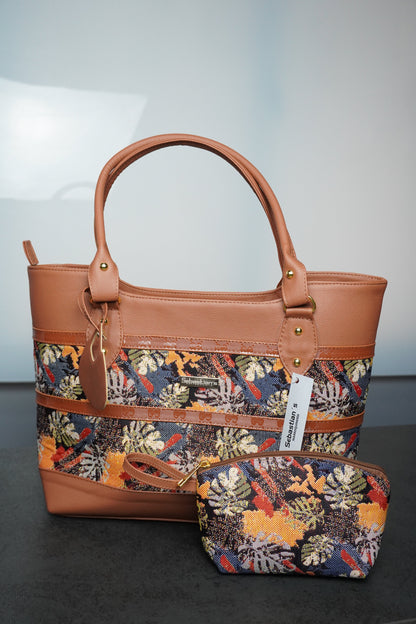 Bolso Tribal edición especial en sintético tipo cuero con cierre en cremallera y amplio espacio interior. Elegante, versátil y perfecto para uso diario en Colombia.