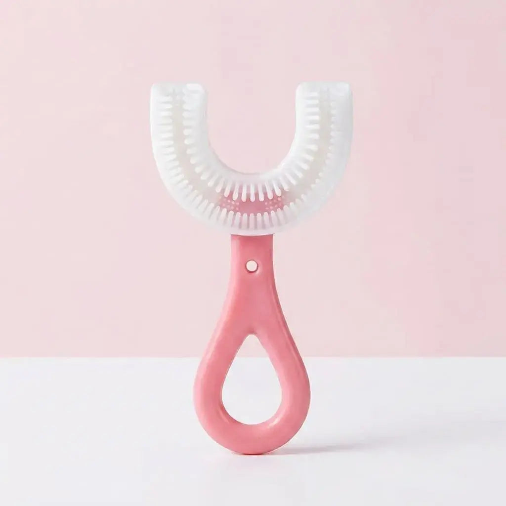 Cepillo Dental Infantil en U de Silicona Suave para bebés y niños. Cerdas flexibles, mango ergonómico y diseño cómodo para encías sensibles y primeros dientes.