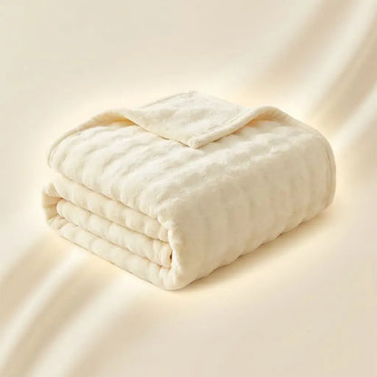 Cobija textura piel de conejo sintética con diseño en relieve tipo piña. Ultra suave y aterciopelada, abrigo cálido para noches frías, liviana y fácil de cuidar. Colores modernos para tu habitación.