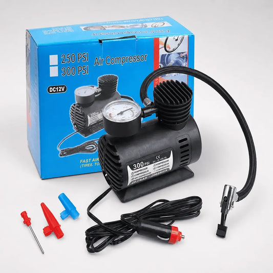 Compresorde aire portátil 12V con manómetro y adaptadores para inflar neumáticos de carro, moto y bicicleta. Compacto y fácil de almacenar.