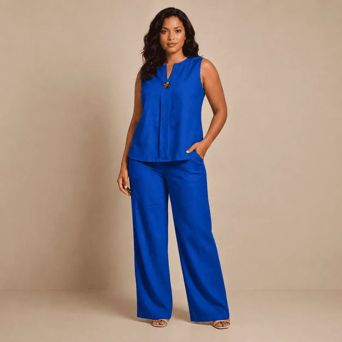 Conjunto Mónaco para mujer con blusa sin mangas y pantalón palazzo de tiro alto. Disponible en tallas S a XL y diferentes colores.
