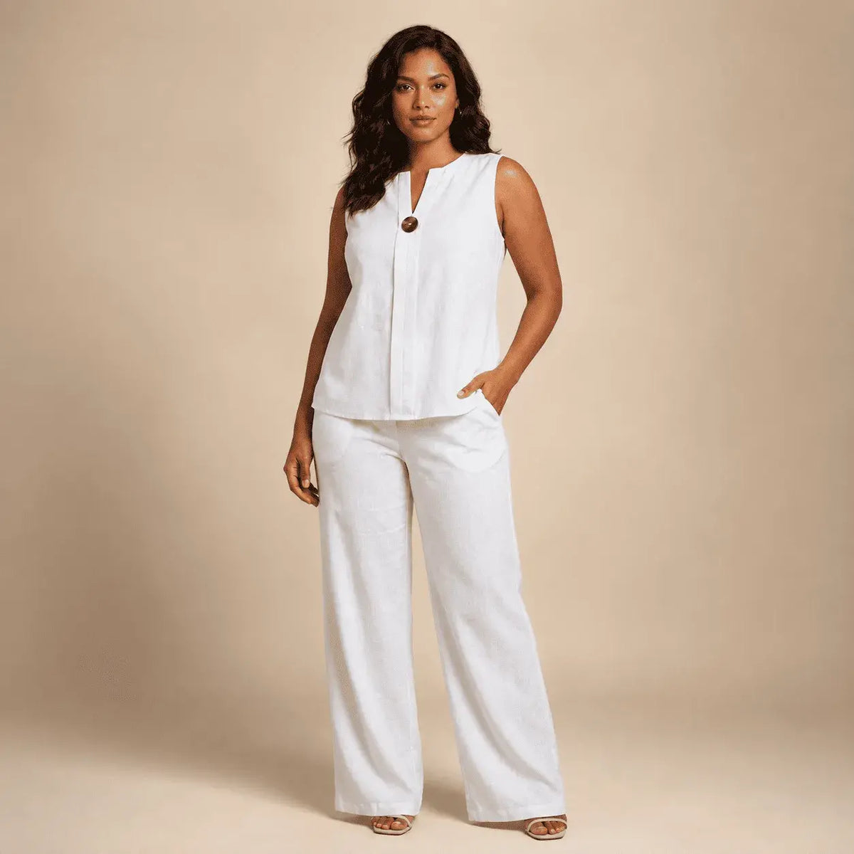 Conjunto Mónaco para mujer con blusa sin mangas y pantalón palazzo de tiro alto. Disponible en tallas S a XL y diferentes colores.
