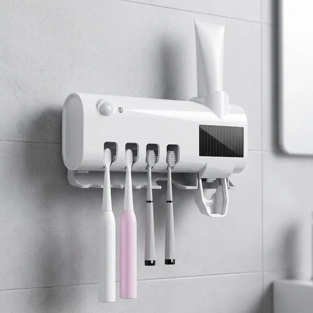 Dispensador de crema dental con porta cepillos UV recargable. Organiza el baño, facilita el uso de la pasta dental y cuenta con carga USB.