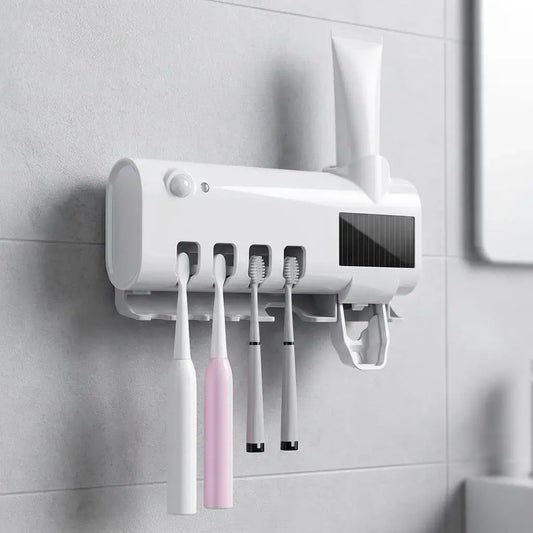 Dispensador de crema dental con porta cepillos UV recargable. Organiza el baño, facilita el uso de la pasta dental y cuenta con carga USB.