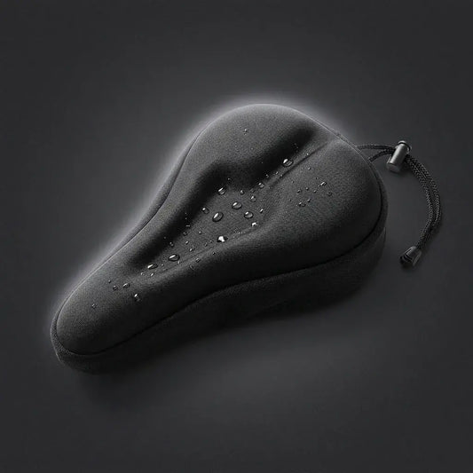 Forro acolchado para sillín de bicicleta DROPS con ajuste elástico, superficie antideslizante y diseño cómodo para uso urbano, recreativo y diario.