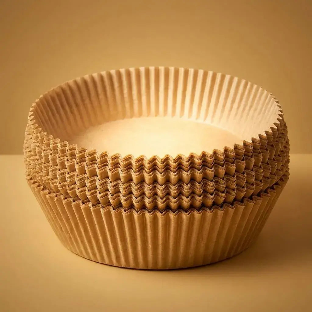 Forros de papel antiadherente para freidora de aire x 100 unidades, resistentes a grasa y calor. Ideales para cocinar más limpio y facilitar la limpieza.