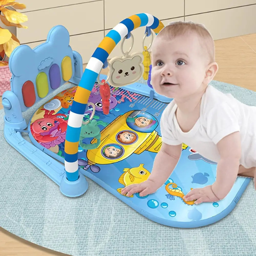 Gimnasio musical para bebé con piano de pedal y juguetes colgantes desmontables. Estimula el desarrollo motor, sensorial y la coordinación desde la primera infancia.