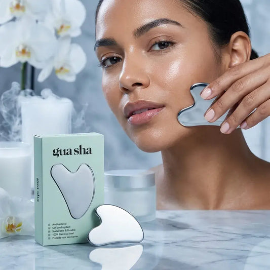 Masajeador gua sha de acero inoxidable para rostro, barbilla, cuello, hombros y espalda. Ideal para complementar rutinas de masaje y cuidado personal.