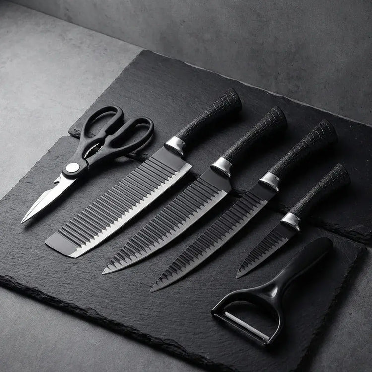 Kit de cuchillos de cocina negro de 6 piezas con acero inoxidable, diseño ergonómico, incluye tijeras y pelador. Ideal para uso diario.