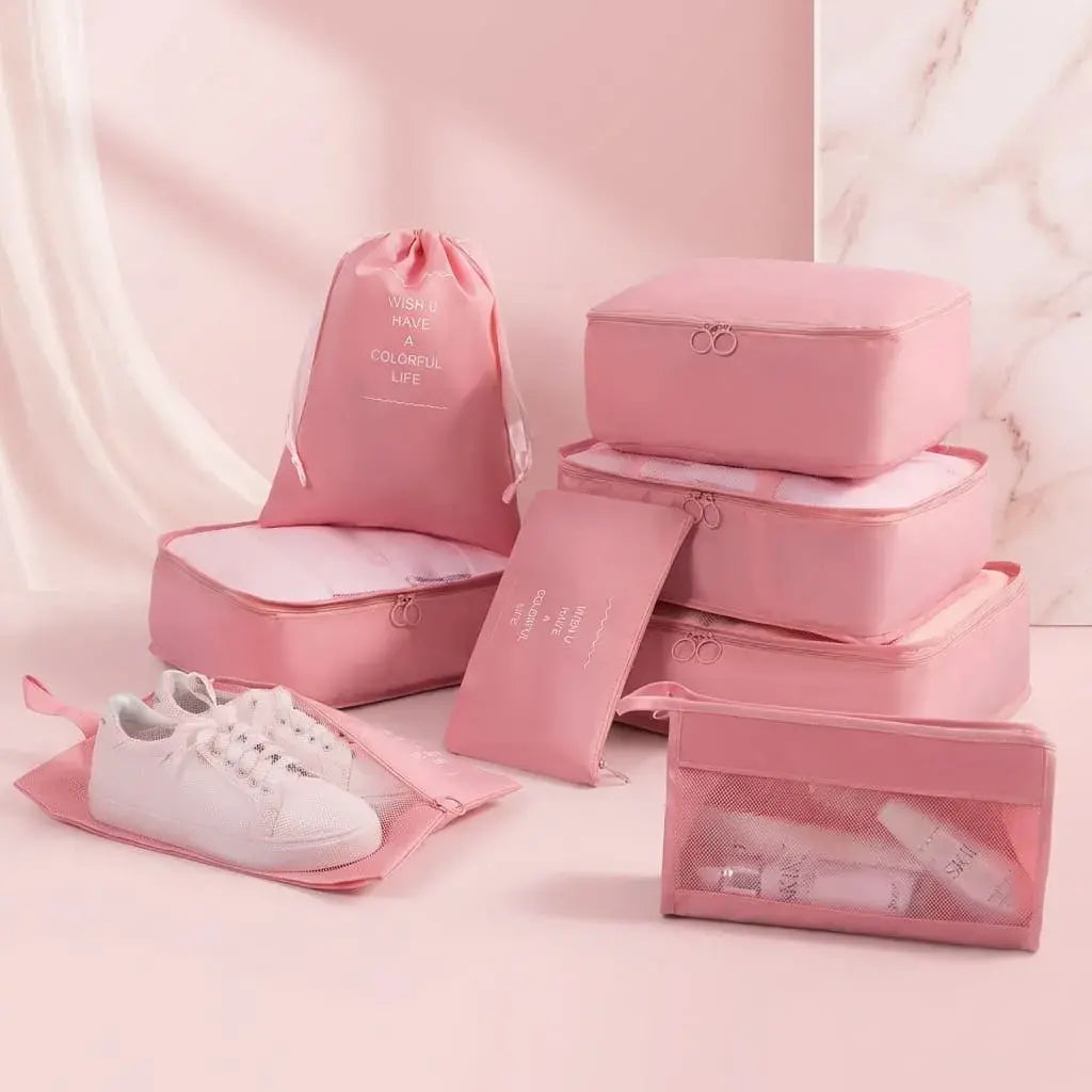 Kit de 8 bolsas organizadoras para maleta en poliéster impermeable. Ligeras, resistentes y perfectas para viajes organizados.