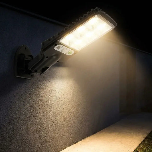 Lámpara Solar LED exterior de 30W con sensor de movimiento, 3 modos de iluminación, cobertura de 180° y protección IP66 para jardín, patio y fachada.