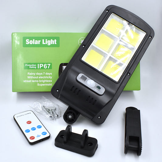 Lámpara solar LED 90W con sensor de movimiento, control remoto y diseño impermeable ideal para exteriores.
