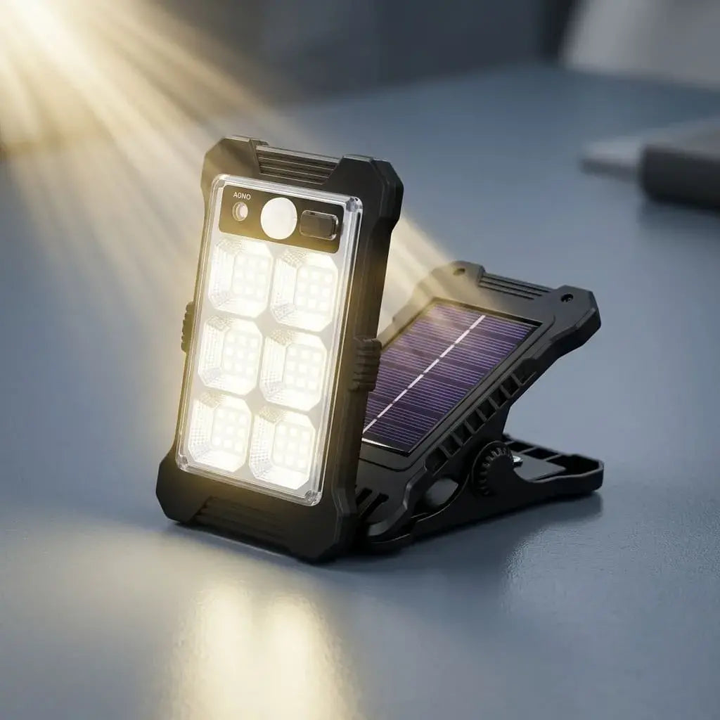 Lámpara solar LED con sensor de movimiento, recargable USB tipo C y clip. Ideal para iluminación práctica en interiores y exteriores.