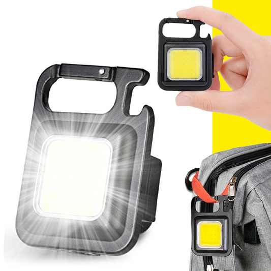 Linterna llavero mini LED COB recargable con alta potencia y modos de luz. Compacta, portátil y perfecta para uso diario o emergencias.