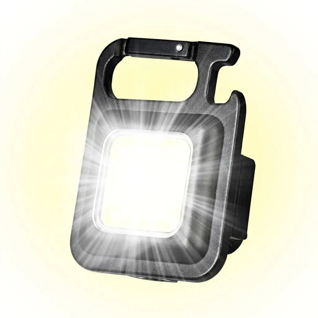 Linterna llavero mini LED COB recargable con alta potencia y modos de luz. Compacta, portátil y perfecta para uso diario o emergencias.