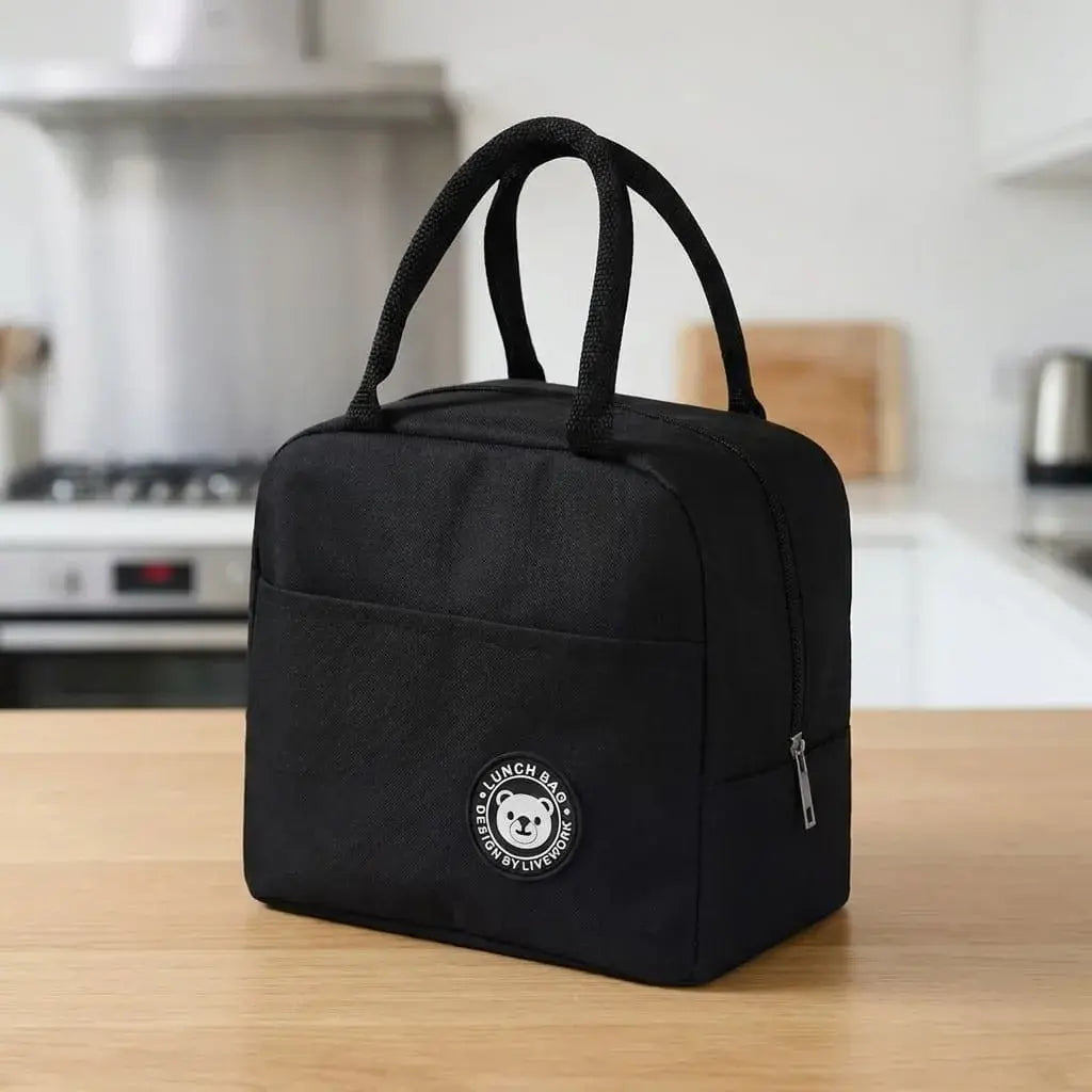 lonchera térmica premium para almuerzo con aislamiento interno, bolsillo delantero, lona resistente y diseño moderno ideal para trabajo, estudio y viajes cortos.