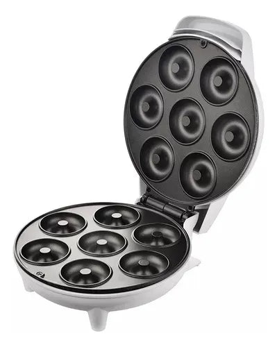 Máquina eléctrica para mini donas con 7 cavidades, revestimiento antiadherente, luces indicadoras, base antideslizante y diseño compacto para repostería casera.