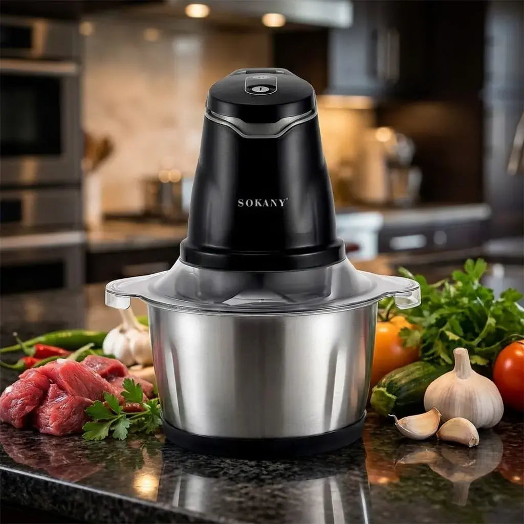 Molino picador eléctrico de 2 litros y 300W con cuchillas de acero inoxidable. Ideal para carnes, verduras, frutas, salsas y preparaciones rápidas en casa.