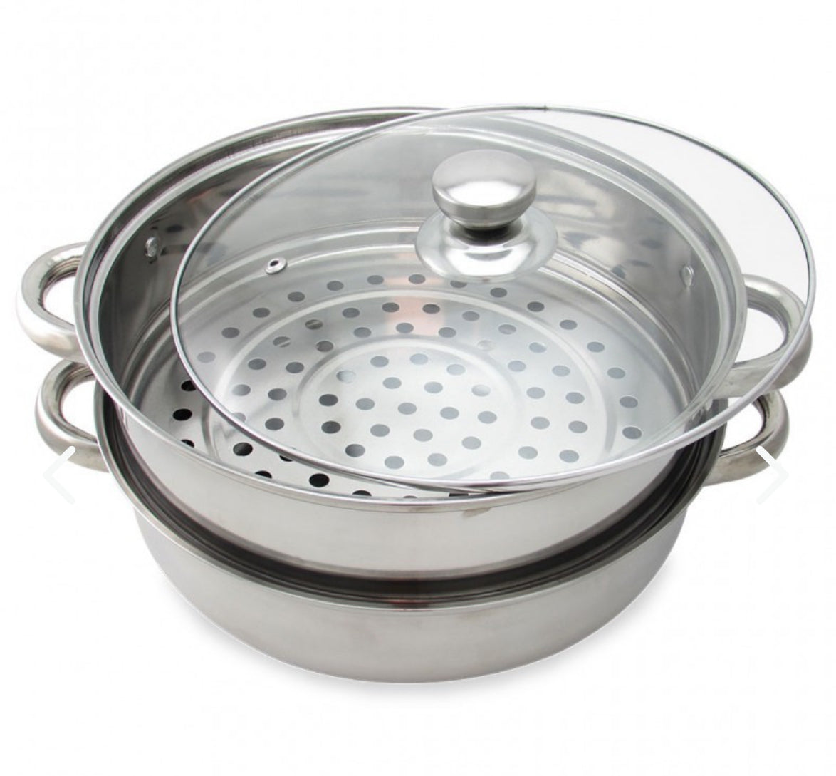 Olla vaporera de doble nivel en aluminio para cocinar sin aceite. Ideal para preparar alimentos saludables conservando sabor y nutrientes.