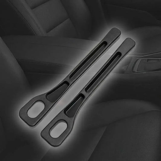 Organizador anticaídas para asiento de carro en poliuretano, con espacio para celular, llaves y tarjetas. Fácil de instalar y ajustar.