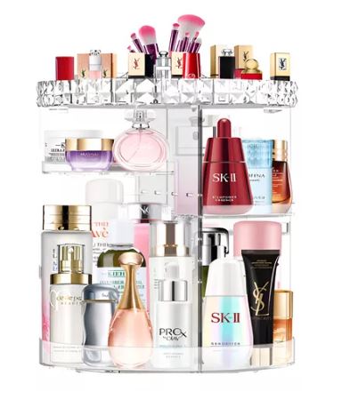 Organizador de maquillaje giratorio 360° en acrílico tipo diamante, con estantes ajustables y amplio espacio para cosméticos, perfumes y joyas.