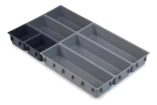 Organizador modular de utensilios de cocina con bandeja, compartimentos y soportes para utensilios largos. Ideal para cajón, armario o encimera, resistente y fácil de limpiar.