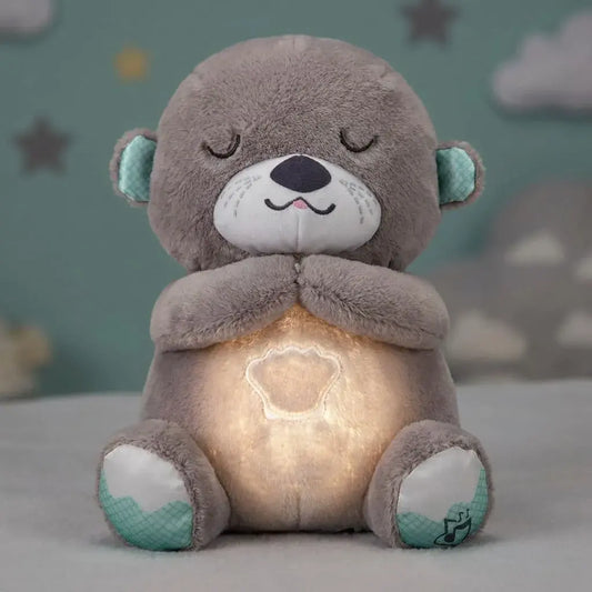 Compra Peluche Nutria Dormilona musical con movimiento y sonidos relajantes. Ideal para acompañar el descanso de tu bebé con suavidad y confort.
