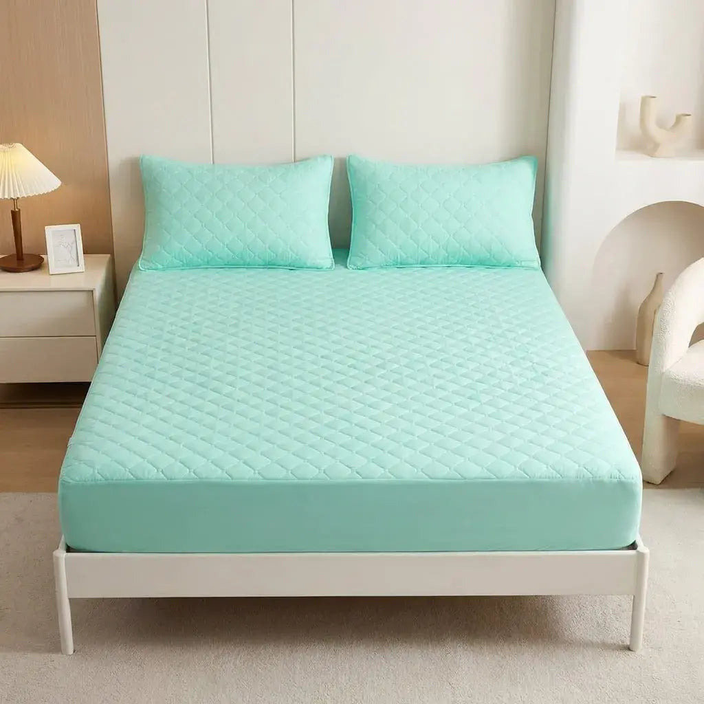 Protector de colchón Elite Premium impermeable con tela fría, propiedades antipolvo y antiácaros, incluye fundas de almohada para protección total.