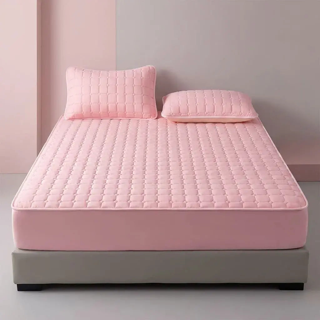 Protector de colchón Elite Premium impermeable con tela fría, propiedades antipolvo y antiácaros, incluye fundas de almohada para protección total.