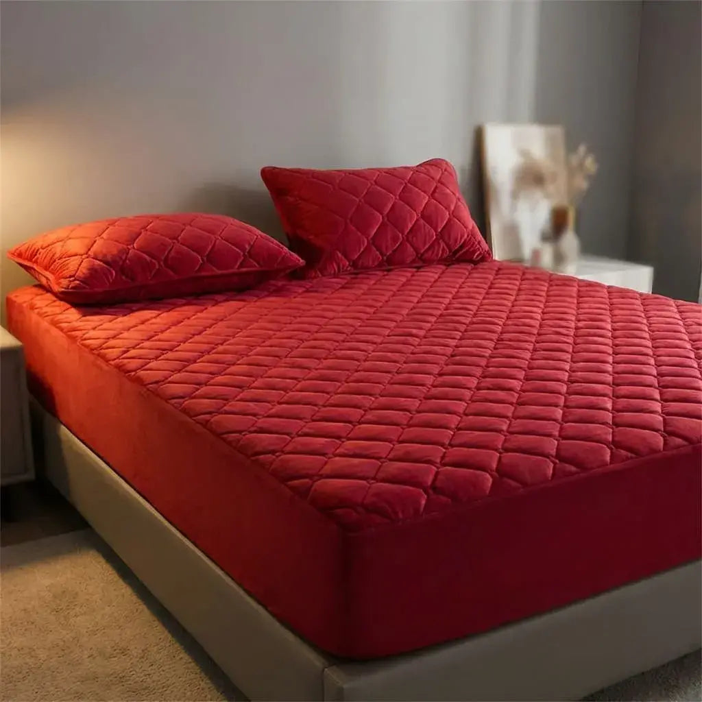 Protector de colchón Elite Premium impermeable con tela fría, propiedades antipolvo y antiácaros, incluye fundas de almohada para protección total.