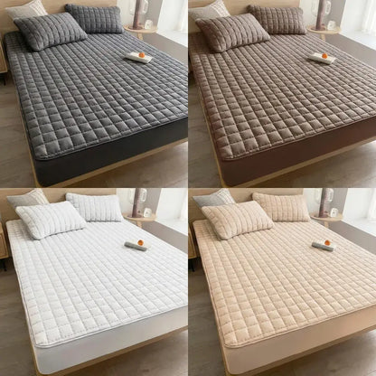 Protector de colchón Elite Premium impermeable con tela fría, propiedades antipolvo y antiácaros, incluye fundas de almohada para protección total.