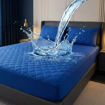 Protector de colchón Elite Premium impermeable con tela fría, propiedades antipolvo y antiácaros, incluye fundas de almohada para protección total.