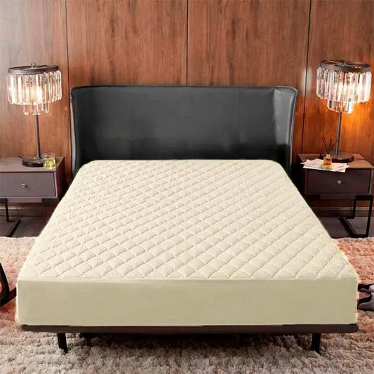 Protector de colchón acolchado antifluido en microfibra con resorte completo y banda de 40 cm. Ideal para uso diario y colchones pillow top.
