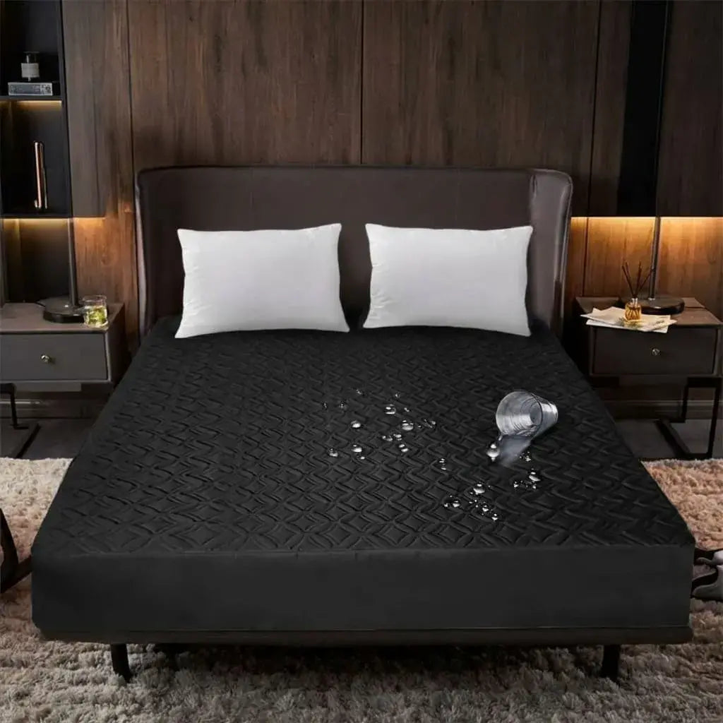Protector de colchón impermeable acolchado en microfibra con resorte completo y banda de 40 cm. Ideal para colchones pillow top y uso diario.