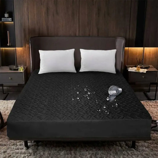 Protector de colchón impermeable acolchado en microfibra con resorte completo y banda de 40 cm. Ideal para colchones pillow top y uso diario.