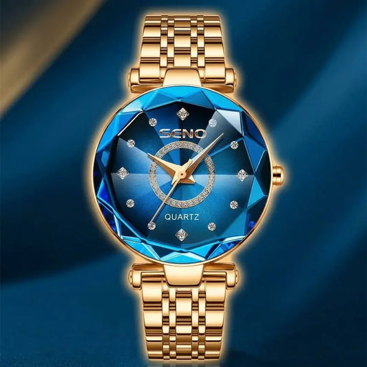 Reloj metálico para mujer marca SENO, diseño elegante y delgado con batería incluida. Ideal para uso diario con estilo y comodidad.
