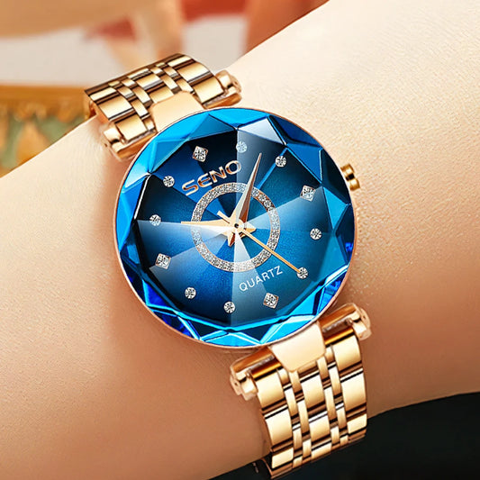 Reloj metálico para mujer marca SENO, diseño elegante y delgado con batería incluida. Ideal para uso diario con estilo y comodidad.