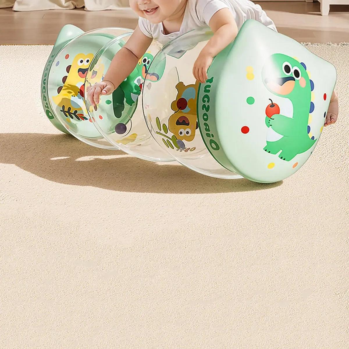 Rodillo inflable para bebés de 6 a 12 meses en PVC con diseño de dinosaurios. Estimula el gateo, fortalece músculos y apoya el desarrollo motor temprano.