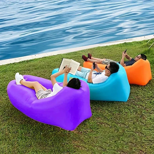 Sofá inflable sin bomba, fácil de usar y cómodo, ideal para camping, playa y exteriores. Diseño portátil con tecnología antidesinflado.