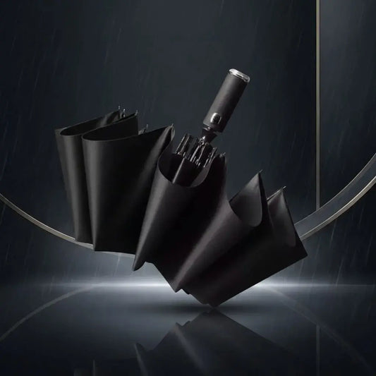 Sombrilla compacta con linterna LED integrada, tela impermeable, mango ergonómico y estructura reforzada. Ideal para lluvia, noche, viajes y uso diario.