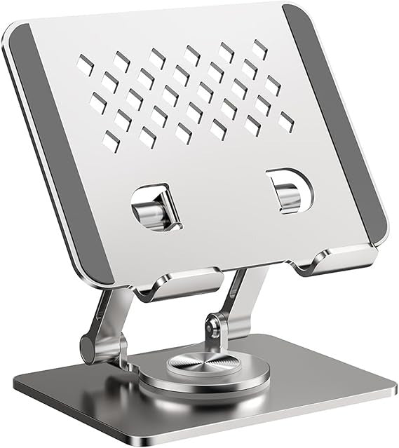 Soporte metálico plegable para tablet y celular con rotación 360°, base antideslizante, apoyos de silicona y diseño portátil para escritorio, oficina, hogar y viajes.