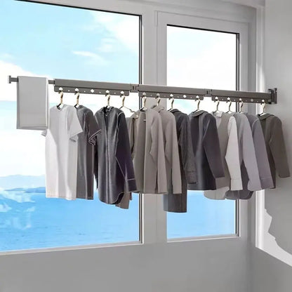 Tendedero plegable retráctil de 3 barras para secar ropa y aprovechar mejor espacios pequeños. Práctico para lavanderías, balcones y apartamentos.