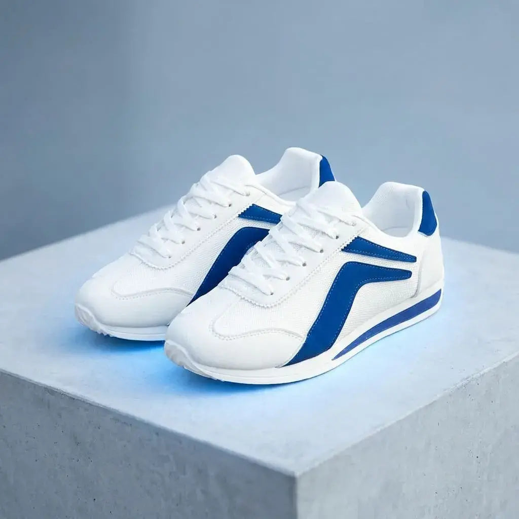 Tenis Spring para Caballero Deportivo Confort. Calzado liviano, transpirable y amortiguado con material textil suave y suela inyectada para uso diario.